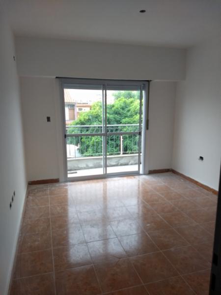 3 ambientes a estrenar con patio y cochera